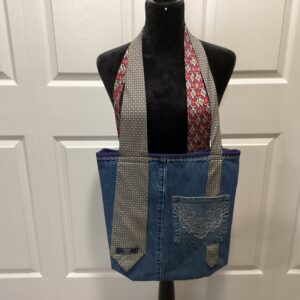 Denim tote tie bag back side navy lining with pocket on the inside and out